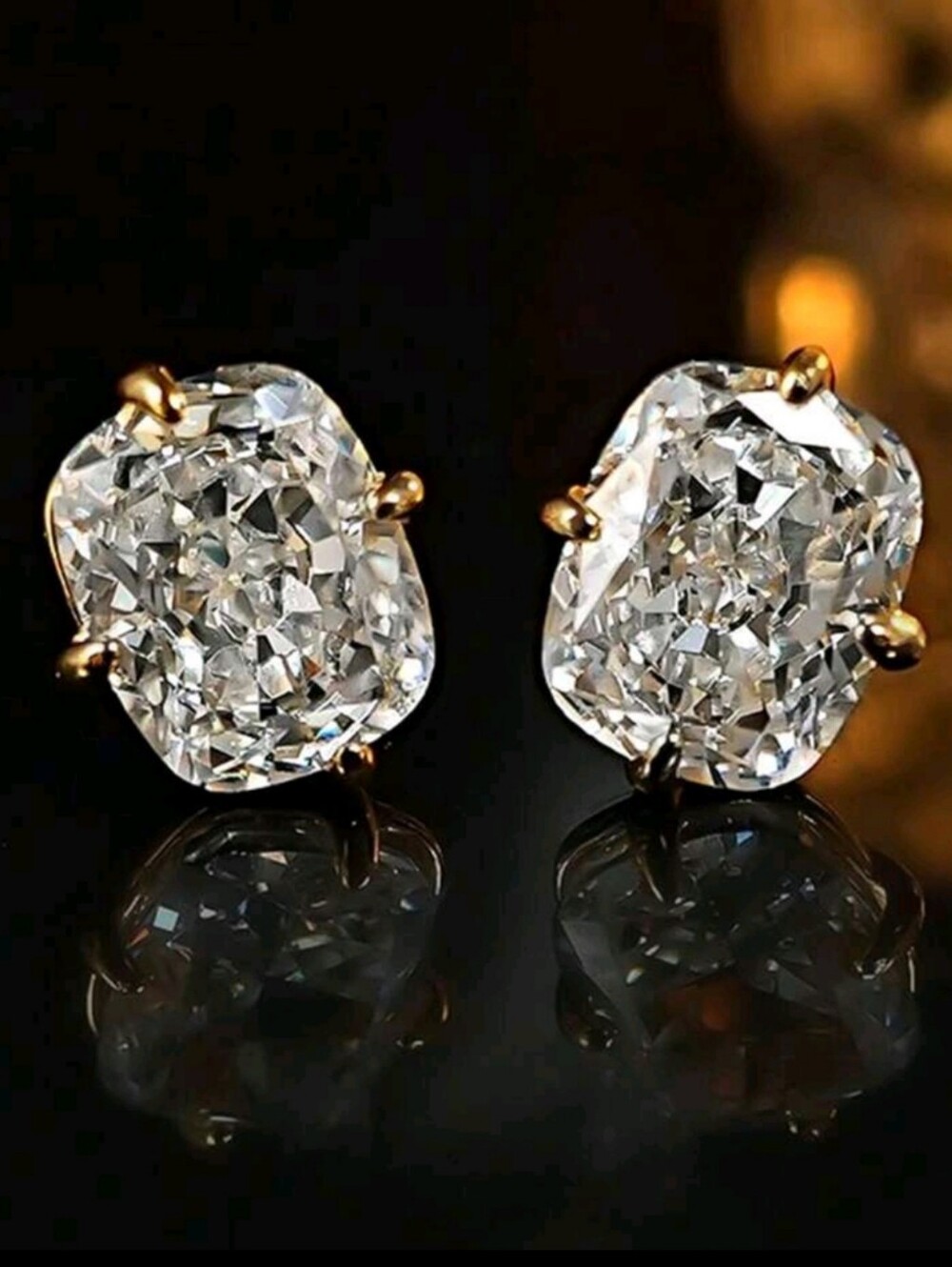 8 ctw Cushion Cut Simulated Diamond Studs Set in Yellow Gold Prongs